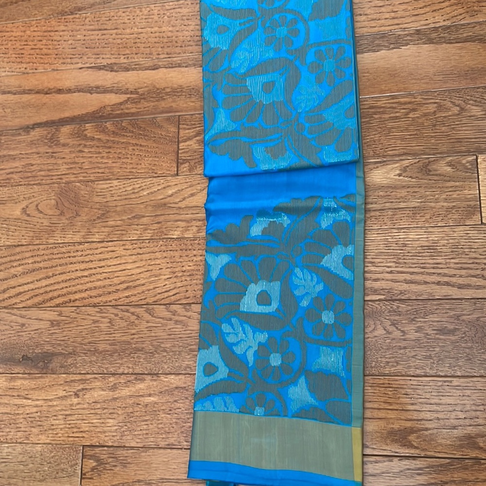 Blue saree with yellow and gold flowers